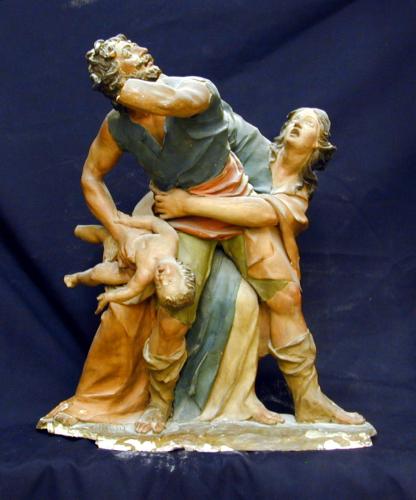 La degollación de los inocentes por Herodes. Mujer intentando recuperar a su hijo.